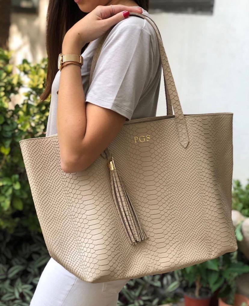 Alex McMaster with the slouchy tote bag, the perfect everyday accesso